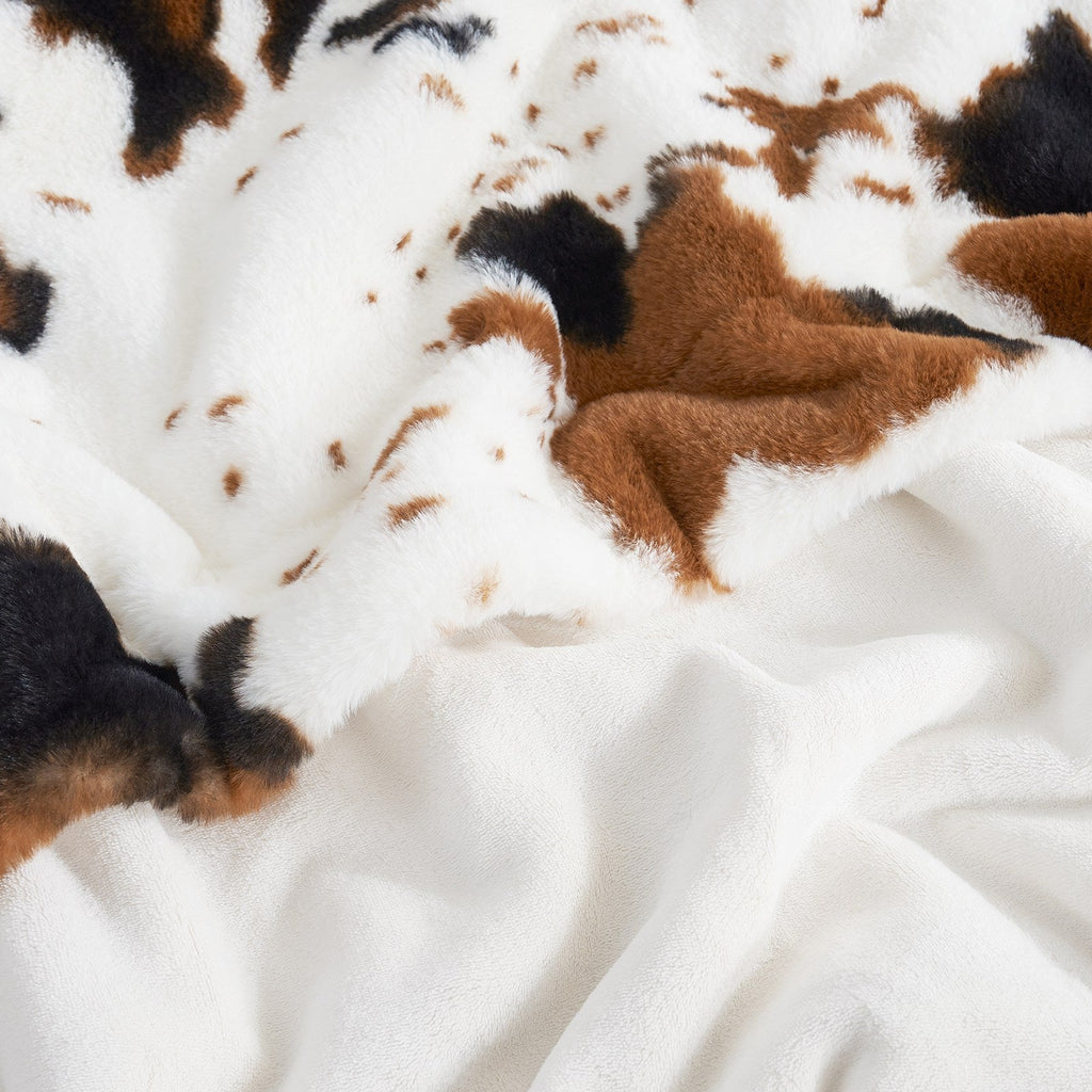 Cow Print Faux Fur Throw